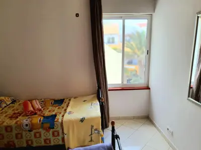a bedroom with a bed and a window at Capo Verde Club - Ca Matteo in Santa Maria