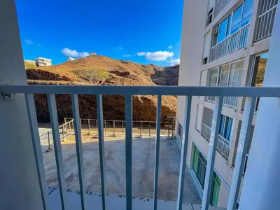 a balcony with a view of a mountain at Marel Bliss Apartments T2 Camila in Mindelo
