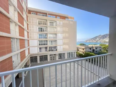 a balcony with a view of a building at Marel Bliss Apartments T2 Camila in Mindelo