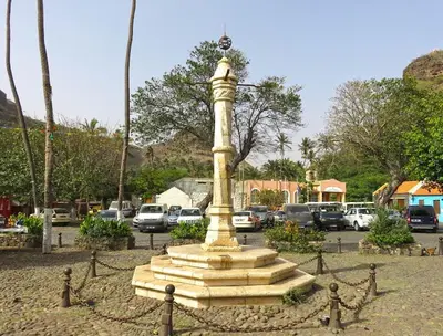 a monument in the middle of a parking lot at Ocean view Apartment 2 in Cidade Velha