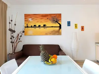 a table with a bowl of fruit on it at Boadream Casa Duria Porta Rossa in Prainha