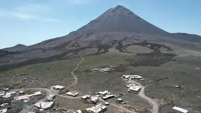 an aerial view of a mountain with houses and a road at Pousada casa Eurico in Portela