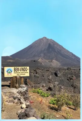 a sign in front of a mountain in the desert at Pousada casa Eurico in Portela