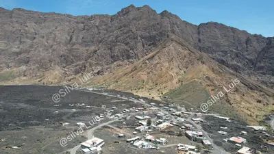 an aerial view of a mountain with a town at Pousada casa Eurico in Portela