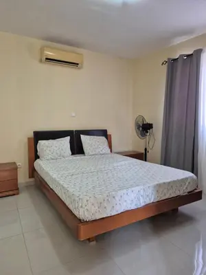 a bedroom with a bed in a room at Casa di Morabeza in Praia