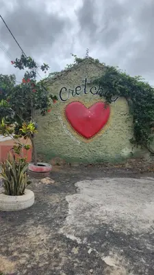 a wall with a red heart painted on it at Casa Emilie T2, 2 bedrooms in Santa Maria