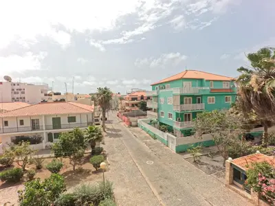 a street in a city with houses at Casa Emilie T2, 2 bedrooms in Santa Maria