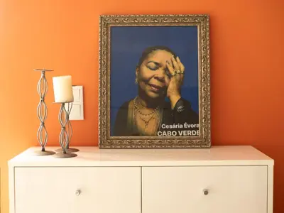 a picture of a man on top of a dresser at Blue Coast Villas - Villa 6 in Cidade Velha