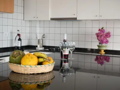 a basket of fruit on a counter in a kitchen at Blue Coast Villas - Villa 6 in Cidade Velha