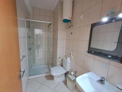 a bathroom with a shower and a toilet and a sink at Boa Vista BriMar Holidays, apartamento with pool in Rabil