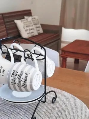 a group of headphones on a plate on a table at HostySpot - Tropical Resort in Santa Maria