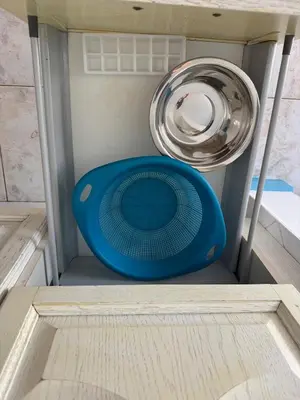 a blue frisbee is sitting in a room at Murdeira V 17 J by RPG Group in Beirona