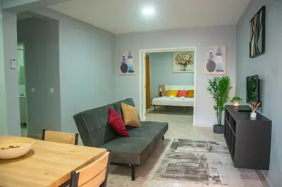 a living room with a couch and a table at Doce de Sal in Santa Maria