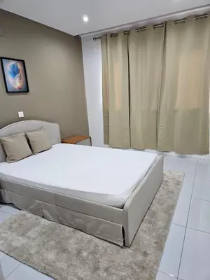 a bedroom with a large bed in a room at T3 Duplex - Palmarejo Grande in Praia