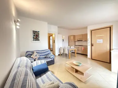 a living room with a couch and a table at Casa Mendonça in Santa Maria