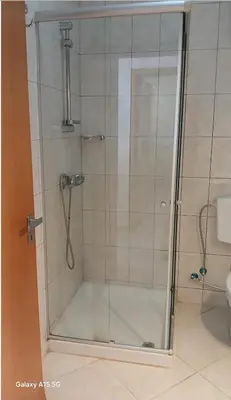 a shower with a glass door in a bathroom at Pandora Ocena View II in Sal Rei