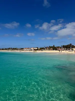 a view of a beach with people in the water at Tropical Mar Profundo in Santa Maria