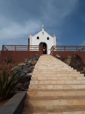 a set of stairs leading to a white church at A1-5101- 3 Bedroom Seaview Apartment in Cape Verde in Sal Rei