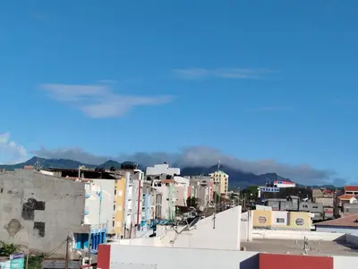 a view of a city with buildings and mountains at Sofia Évora Spínola in Cova Figueira