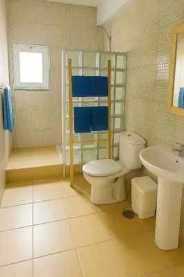 a bathroom with a toilet and a sink at Casa di Mar in Santa Maria
