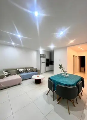 a living room with a couch and a table at Casa BB&Djassi - Apartment T2 in Ponta do Sol