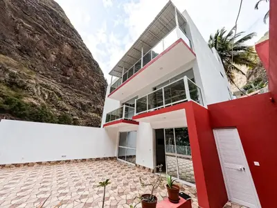 a house built into a mountain at Residencial Mãe Nona in Ribeira Grande