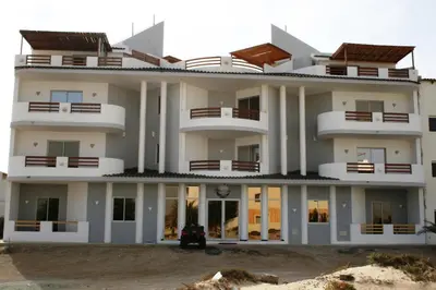 a large white building with a lot of windows at Endless Summer B6 in Sal Rei