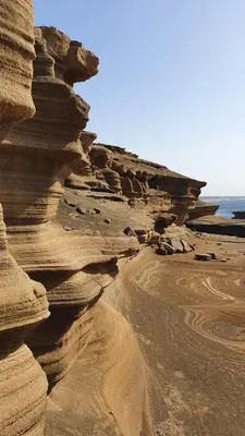 a group of rocks on a beach near the ocean at Studio Alto Saco in Tarrafal