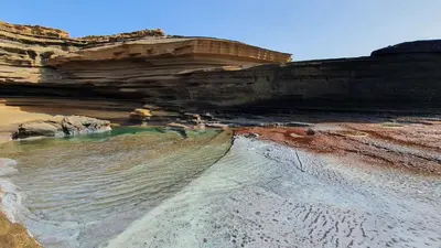 a view of a cliff with a body of water at Studio Alto Saco in Tarrafal