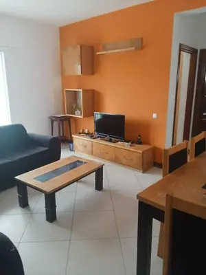 a living room with a couch and a coffee table at Gada House in Sal Rei