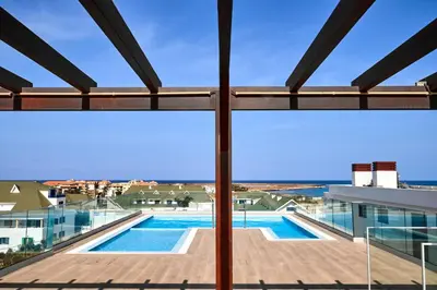 a view from the balcony of a building with a swimming pool at Sal Sol & Mar - Flor de Sal in Santa Maria