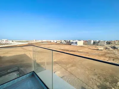 a glass roof with a view of a desert at T1 panorâmico no Medsal Residence in Santa Maria