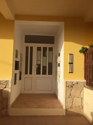 a entrance to a house with a door at Flat 4U in Santa Maria