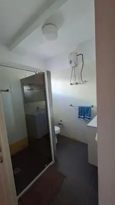 a bathroom with a shower and a toilet at Star House Murdeira, Sal Island, Cape Verde in Beirona