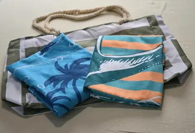 two bags sitting on top of a table at Nature Breeze in Sal Rei