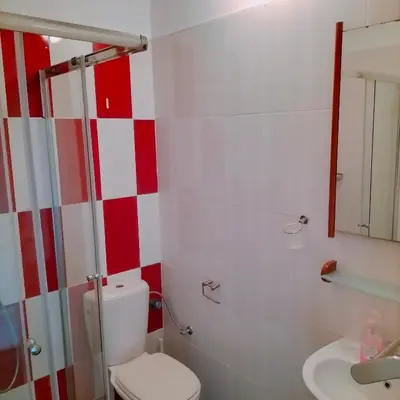 a bathroom with a toilet and a sink at Hotel Miranda & Miranda in Ponta do Sol