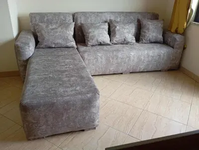 a couch sitting in a living room at Avenida NHU SANTIAGO in Santa Cruz
