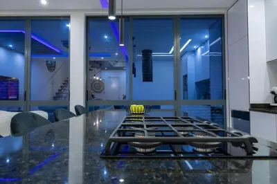 a kitchen with a stove top on a counter at Marel Bliss Apartments T3 - Isabel in Mindelo