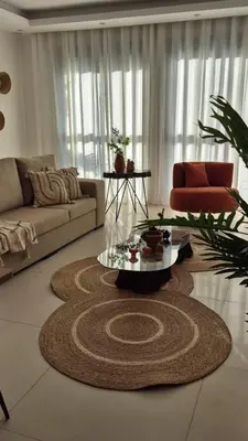 a living room with a couch and a table at kriola Breeze in Praia