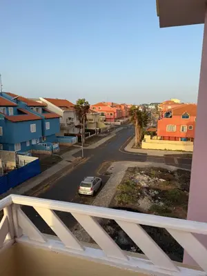 a view from a balcony of a street with a car at Seaside apartment in Shell Beach in Santa Maria