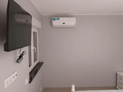 a room with a wall mounted air conditioner on the wall at VISTA INVEST Apartamentos in Mindelo
