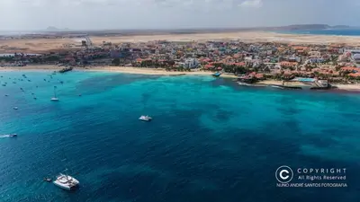 an aerial view of a beach with boats in the water at Casa do Sal - AC, Free Wi-Fi, Near Beach in Santa Maria