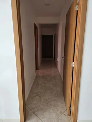 an empty hallway with a hallway leading into a room at Golden Flow in Espargos