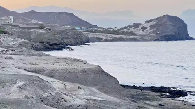a large body of water with mountains in the background at Sossego e mar, Lazareto in Lazareto