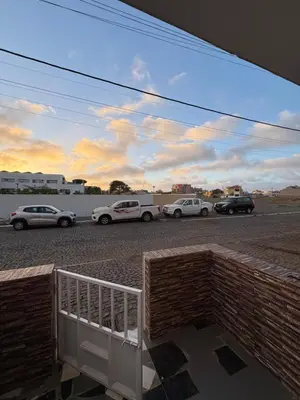 a view of cars parked in a parking lot at P&SGuestHouse in Espargos