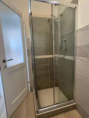 a shower stall with a glass door in a bathroom at Ca' Zen in Sal Rei