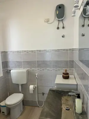a bathroom with a toilet and a sink at Ca' Zen in Sal Rei