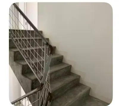 a set of stairs with a metal hand rail at Modern&Central Mindelo - 1A in Mindelo