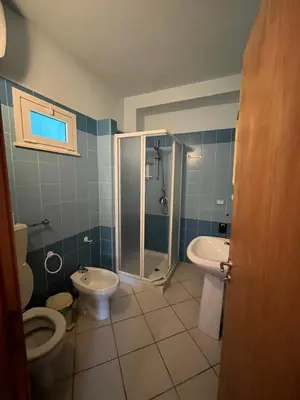 a bathroom with a shower and a toilet and a sink at WIND Ocean View Lobster Dinner Included in Santa Maria