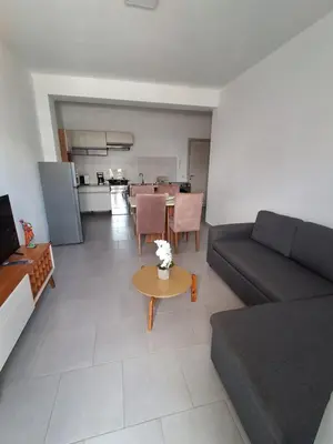 a living room with a couch and a table at Apartamento Estoril in Sal Rei